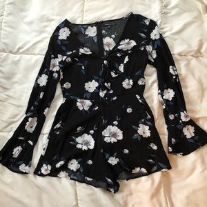 Black romper with flowers